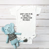 Don't Look at Me, That Smell Is Coming From My Daddy baby bodysuit lifestyle photo - white bodysuit displayed near elephant nursery decor