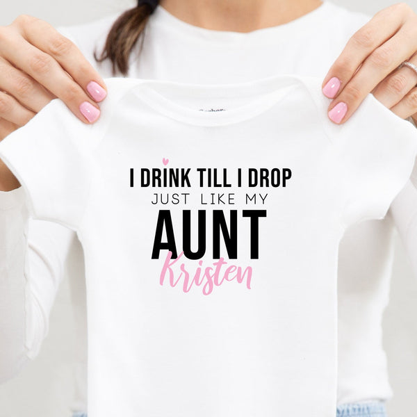I Drink Till I Drop, Just Like My Aunt personalized baby bodysuit lifestyle photo - white bodysuit being held by a woman