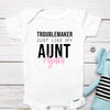 Troublemaker, Just Like My Aunt personalized baby bodysuit lifestyle photo - white bodysuit displayed near elephant nursery decor