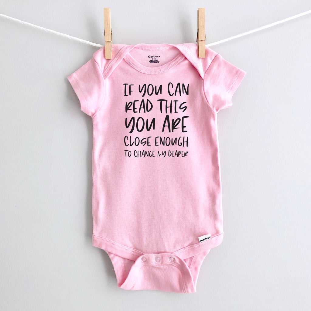 If You Can Read This You Are Close Enough to Change My Diaper baby bodysuit - pink short sleeve