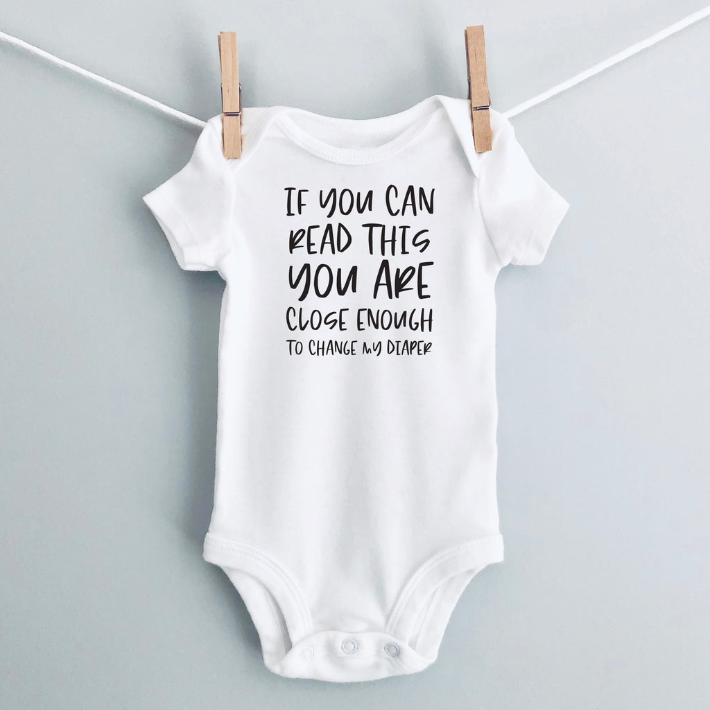 If You Can Read This You Are Close Enough to Change My Diaper baby bodysuit - white short sleeve