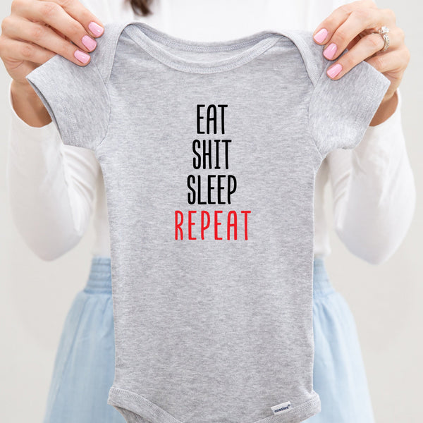 Eat Shit Sleep Repeat baby bodysuit lifestyle photo - gray bodysuit being held by an adult
