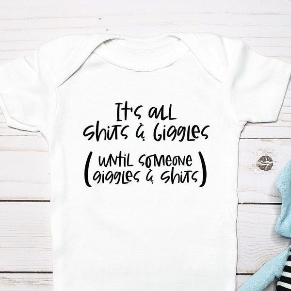 It's All Shits & Giggles (Until Someone Giggles & Shits) baby bodysuit lifestyle photo - white bodysuit displayed near elephant nursery decor