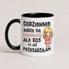 A white ceramic mug with a black handle and black interior, featuring Polish text and a cartoon illustration of a blonde woman in a pink robe.