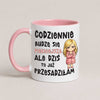 A white ceramic mug with a pink handle and interior, featuring Polish text and a cartoon illustration of a blonde woman in a pink coat.