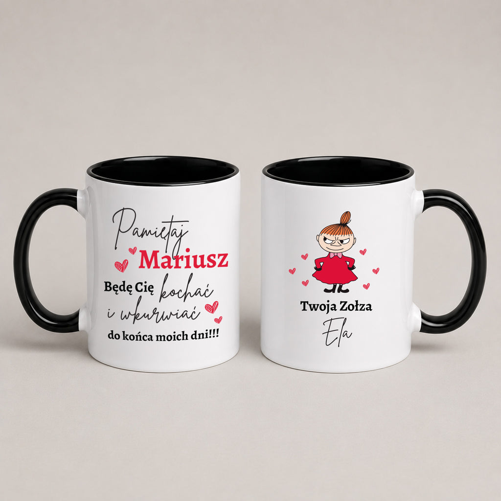 Two white ceramic mugs with black interiors and handles, shown side by side on a light beige background. The left mug has Polish text reading 'Pamiętaj Mariusz' with red and black lettering and small pink hearts.