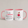 Two white ceramic mugs with pink interiors and handles, shown side by side on a light gray background. The left mug has Polish text in black and red, and the right mug features a cartoon girl in a red dress with Polish text.