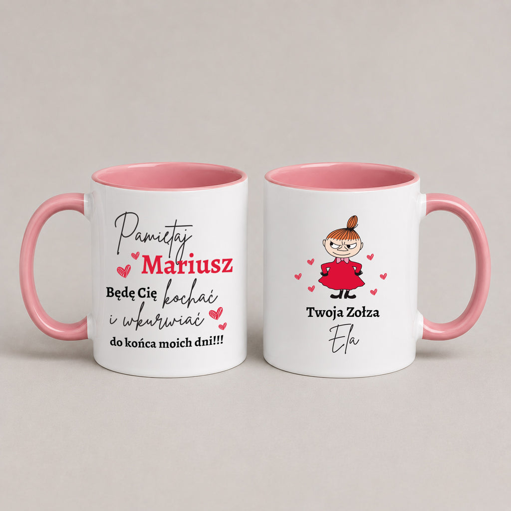 Two white ceramic mugs with pink interiors and handles, shown side by side on a light gray background. The left mug has Polish text in black and red, and the right mug features a cartoon girl in a red dress with Polish text.