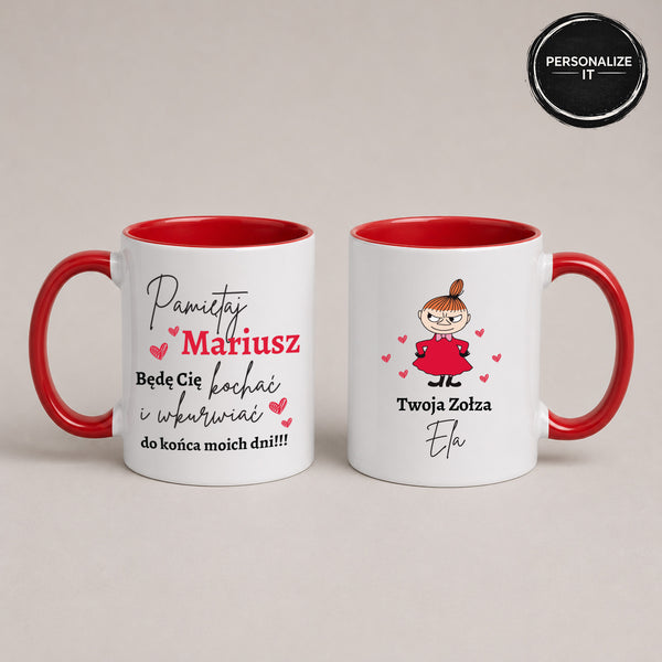 Two white ceramic mugs with red interiors and handles, shown side by side on a light beige background. The left mug has Polish text reading 'Pamiętaj Mariusz' with small red hearts.