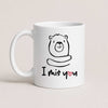 A White 11oz ceramic mug with a hand-drawn bear illustration and the text 'I Miś You' with a small red heart
