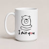 A White 15oz ceramic mug with a hand-drawn bear illustration and the text 'I Miś You' with a small red heart