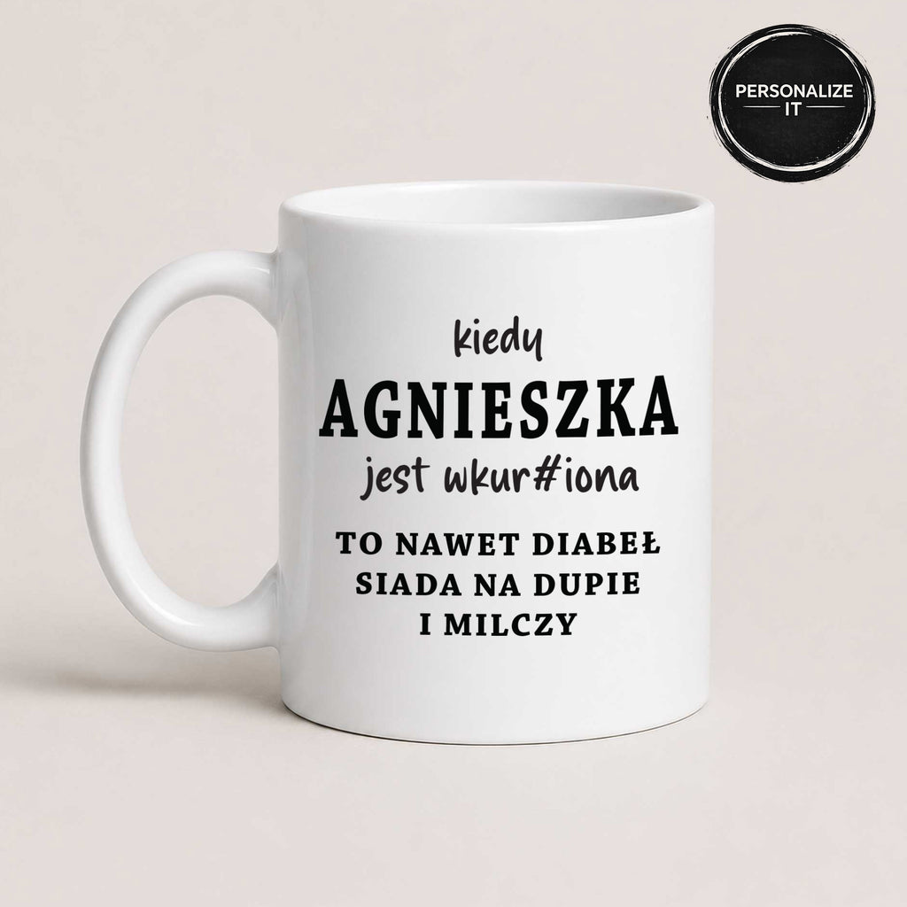 White 11oz personalized Polish mug reading 'Kiedy [Imię] jest wkur#iona' with a 'Personalize It' badge showing customers can add any name