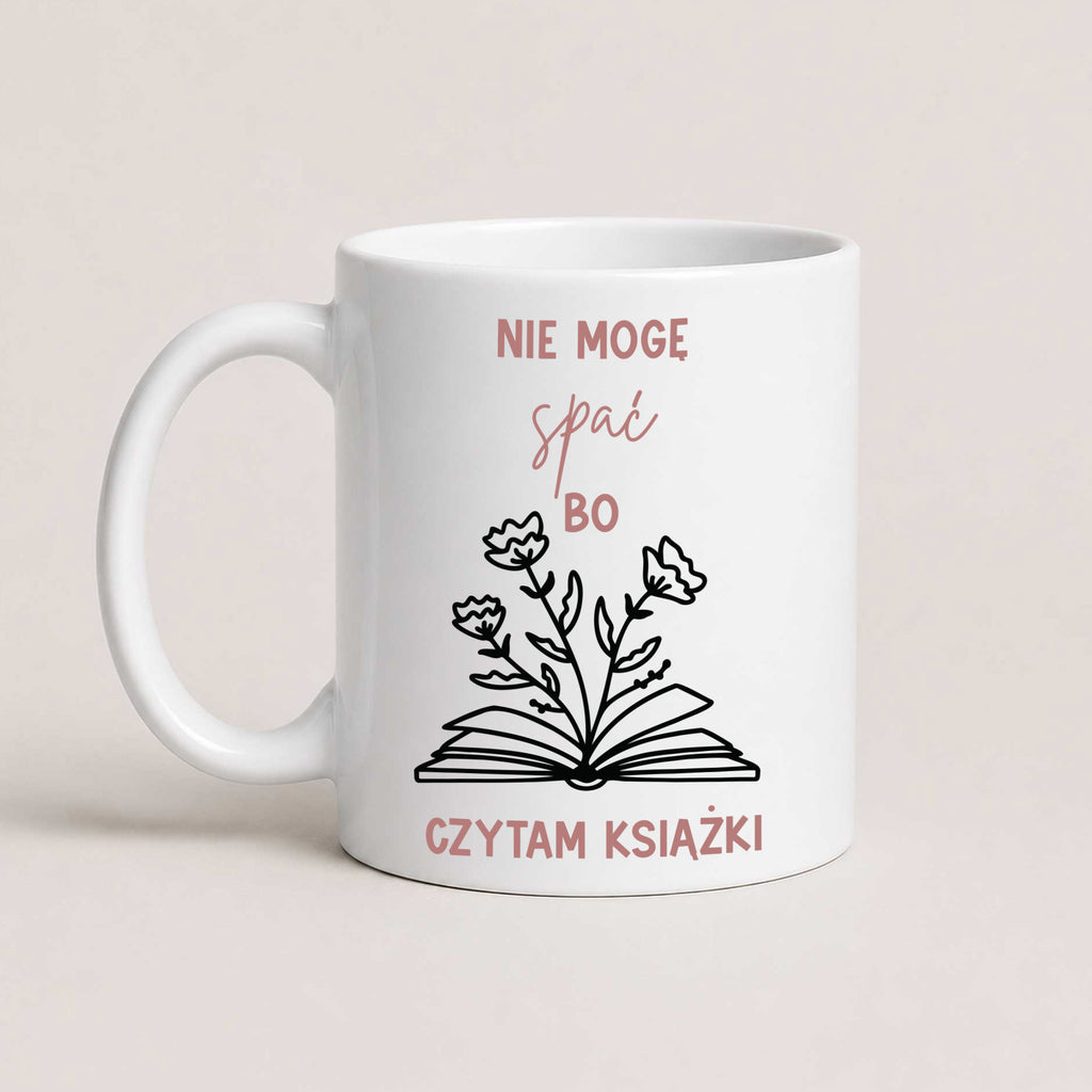 Polish book lover mug reading 'Nie mogę spać, bo czytam książki' with hand-drawn book and flowers illustration, white 11oz mug
