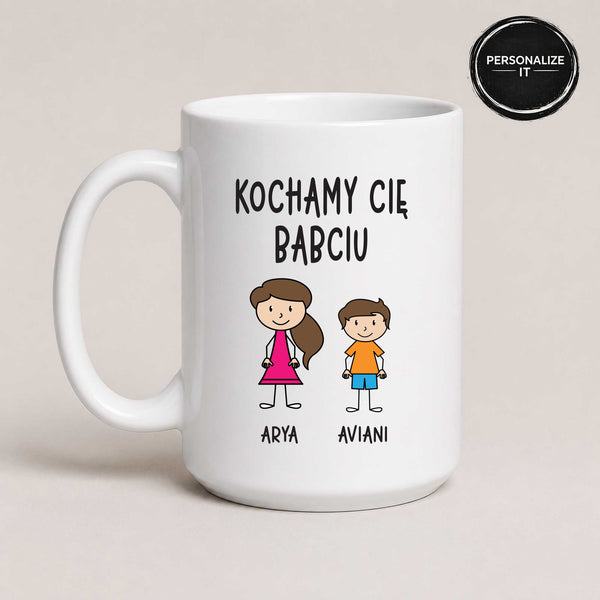 Close-up view of a White 15oz ceramic Polish coffee mug featuring custom grandchildren illustrations, names, and the message 'Kochamy Cię Babciu'