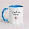 A Blue 11oz ceramic Polish coffee mug featuring the 'Babcia Idealna' design with a delicate heart accent