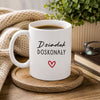Lifestyle photo of the Polish mug featuring the 'Dziadek Doskonały' design with a subtle heart accent