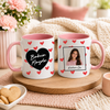 Lifestyle photo of the Polish mug featuring a custom name, custom photo, hearts, and the message 'Kocham Cię'