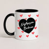 A Black 11oz ceramic Polish coffee mug featuring the 'Najlepsza Babcia' design with a bold black heart and red heart pattern