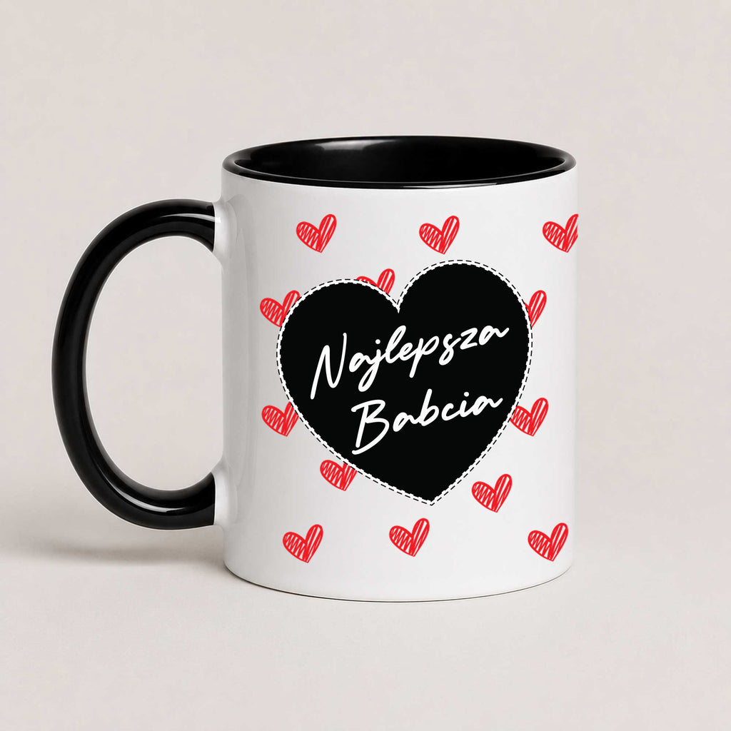 A Black 11oz ceramic Polish coffee mug featuring the 'Najlepsza Babcia' design with a bold black heart and red heart pattern