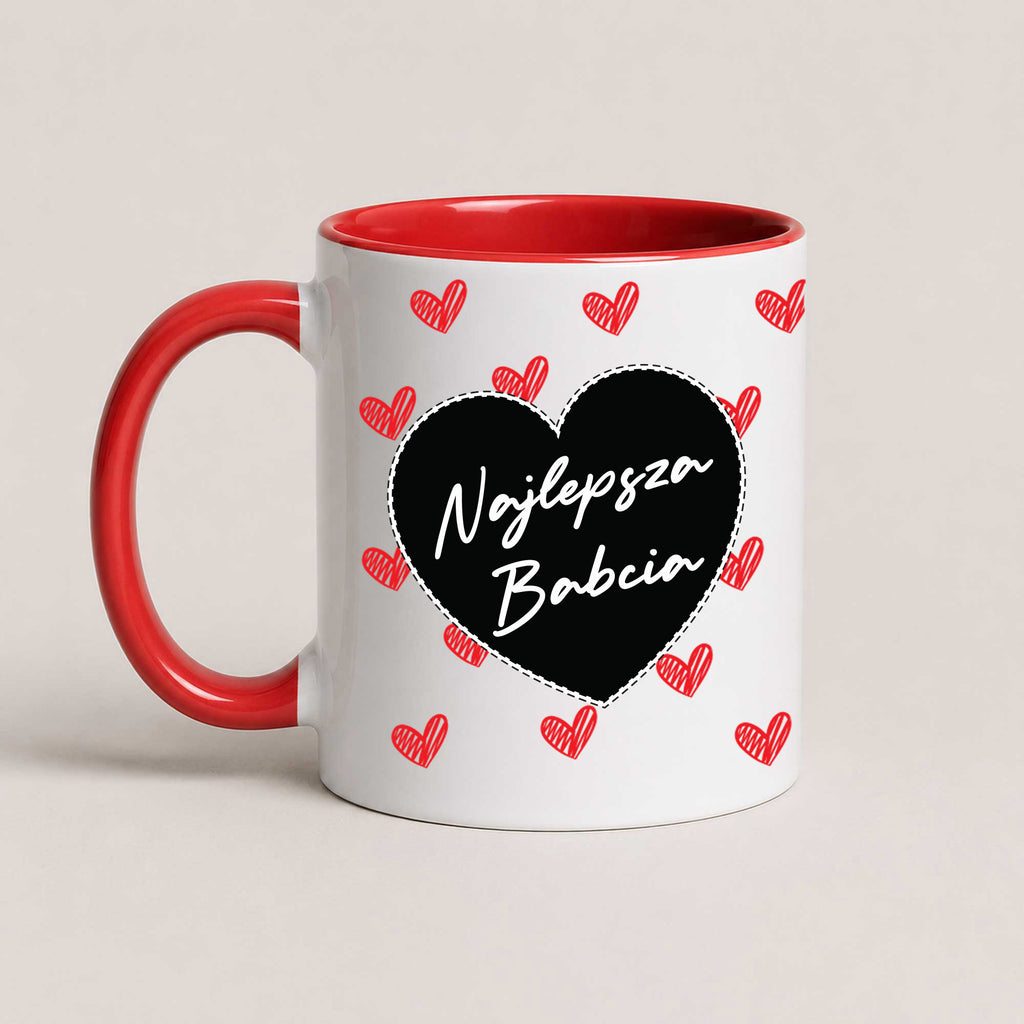A Red 11oz ceramic Polish coffee mug featuring the 'Najlepsza Babcia' design with a bold black heart and red heart pattern