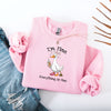 "I'm Fine, Everything Is Fine" Funny Duck Crewneck in Pink - Lifestyle Photo