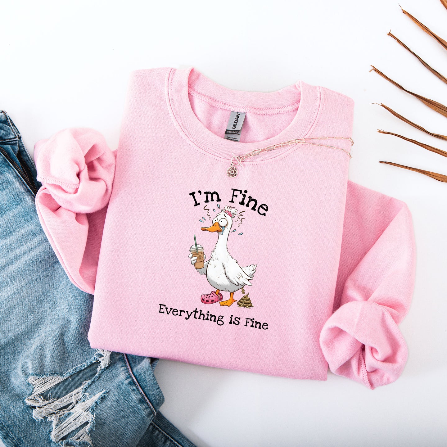 "I'm Fine, Everything Is Fine" Funny Duck Crewneck in Pink - Lifestyle Photo