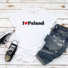 Woman wearing white T-shirt with I love Poland heart design
