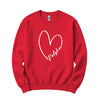 Red crewneck sweatshirt with white heart outline and Polska script