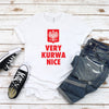 Woman wearing white T-shirt with red Polish eagle crest and VERY KURWA NICE text
